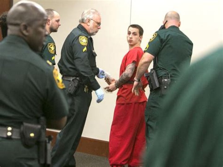 Michael Bargo looks back to his family upon arriving in the courtroom