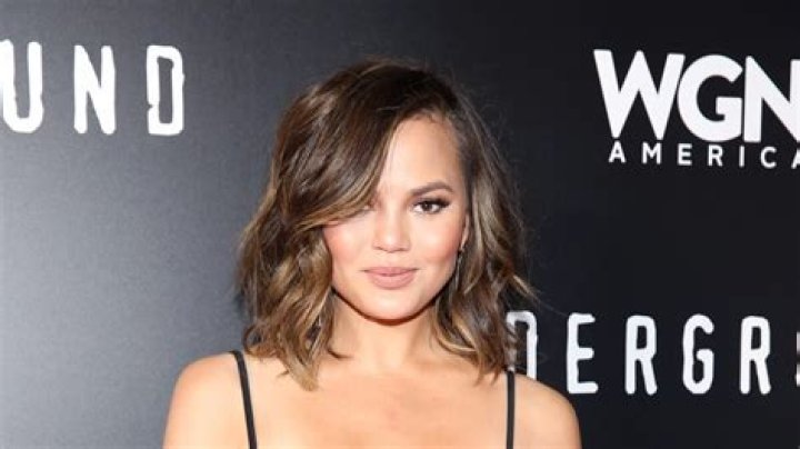 Oops! Chrissy Teigen Suffers Nip Slip Onstage